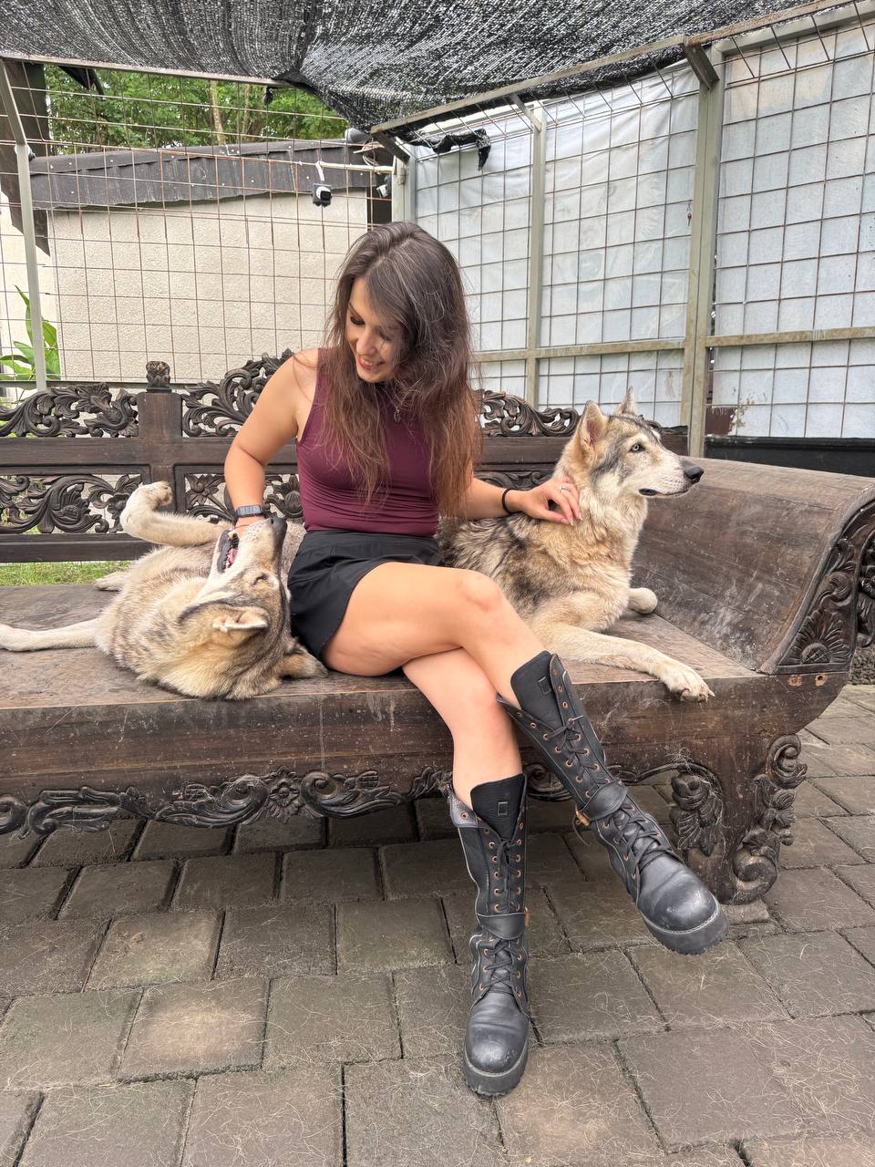 Mariia with wolfdogs — calm in the presence of instinct
